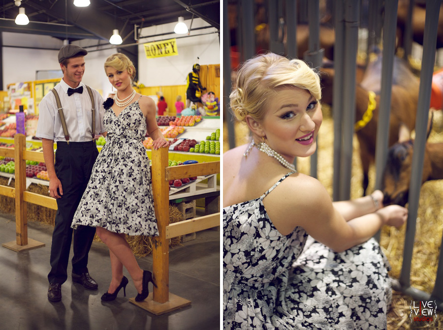 happy couple with fruits and animals at the fair