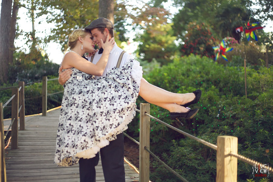 guy carrying and kissing girl, north carolina engagement photos