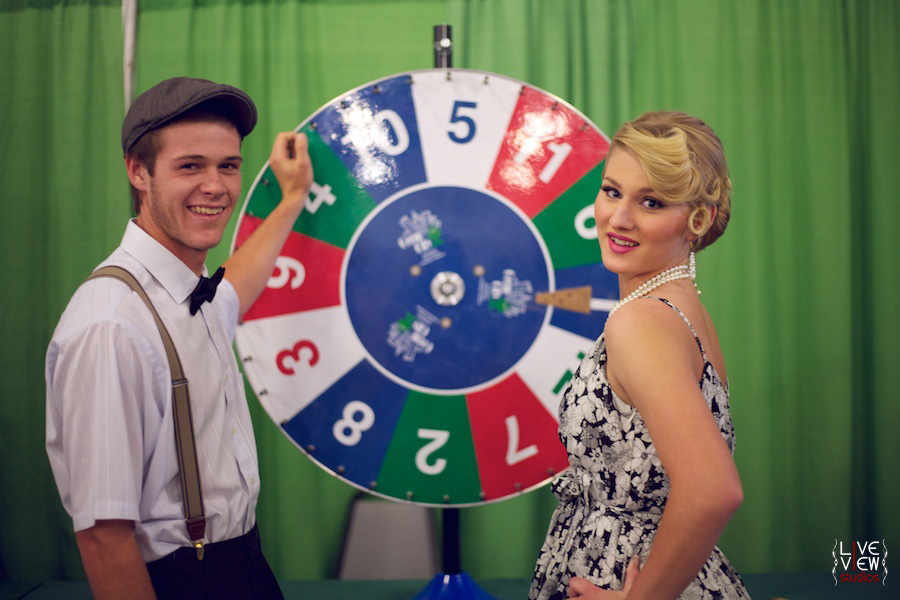 vintage couple playing games at the fair