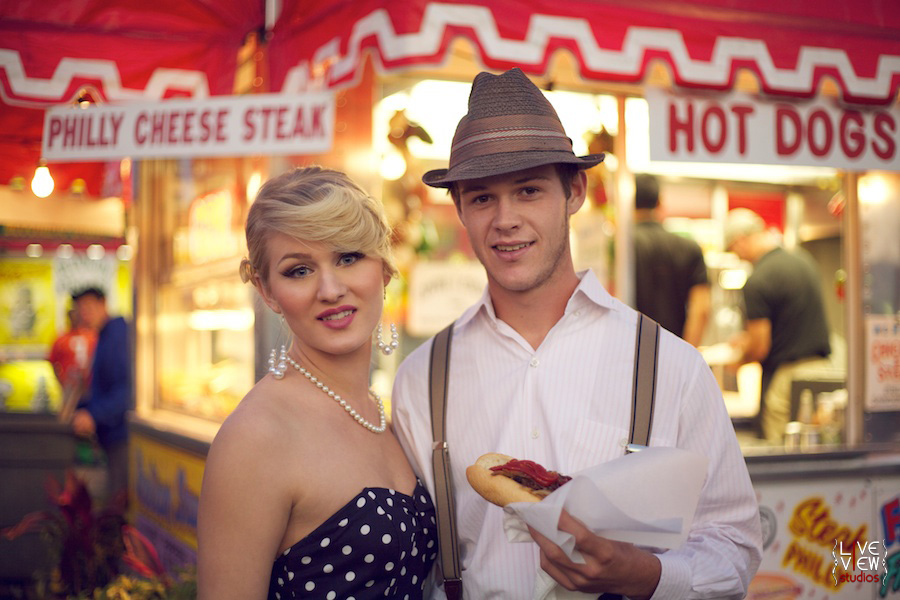 retro glam couple at the fair