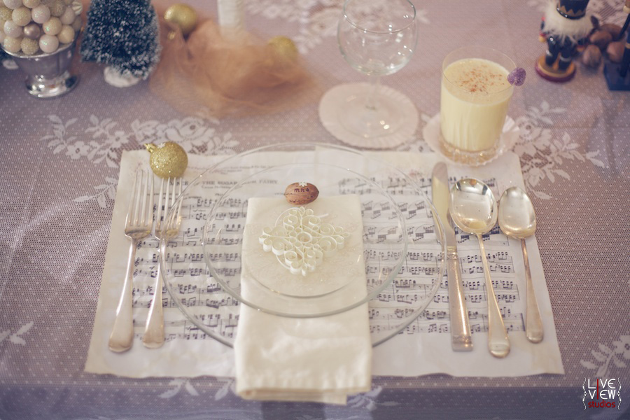 A winter wedding table setting idea created with antique crystal and 