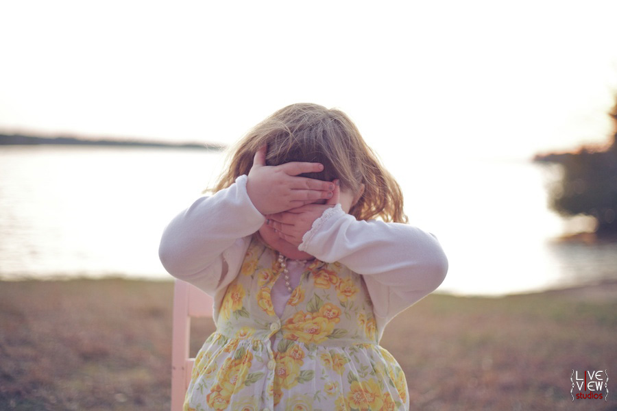 girl playing peek a boo vintage raleigh photography