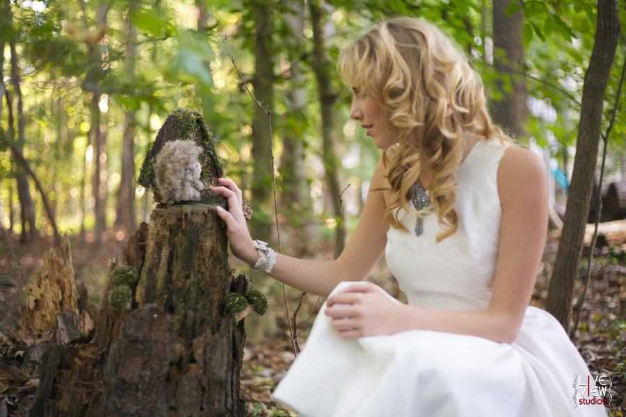 bride talks to squirrel in enchanted forrest, custom wedding jewelry