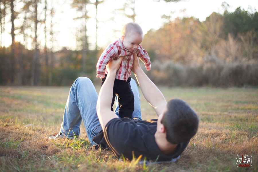 dad holding baby boy