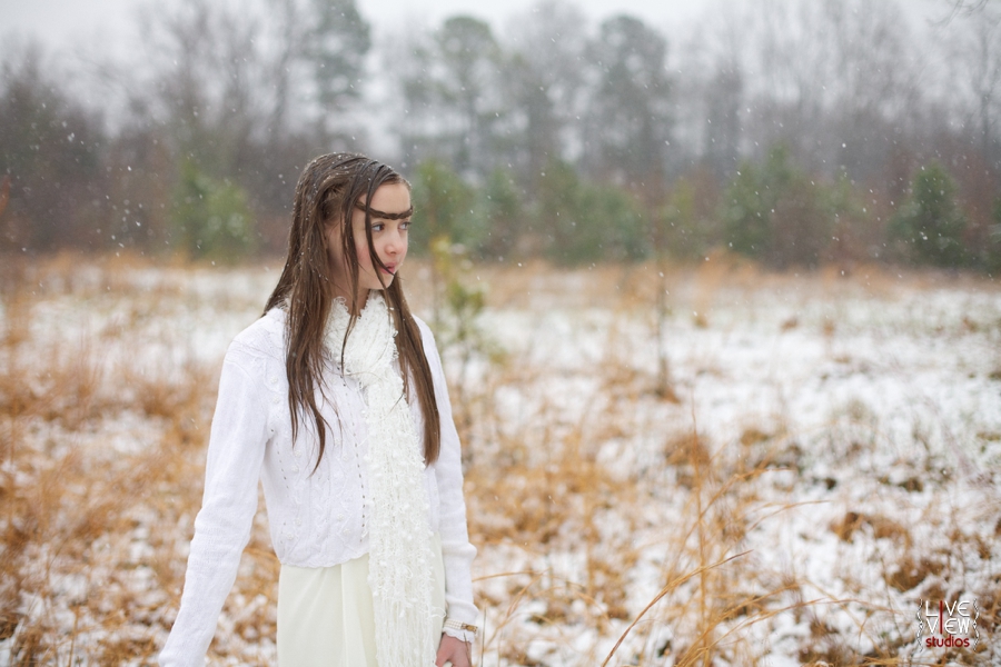 young girl enjoying north carolina snow, ethereal children's portraits