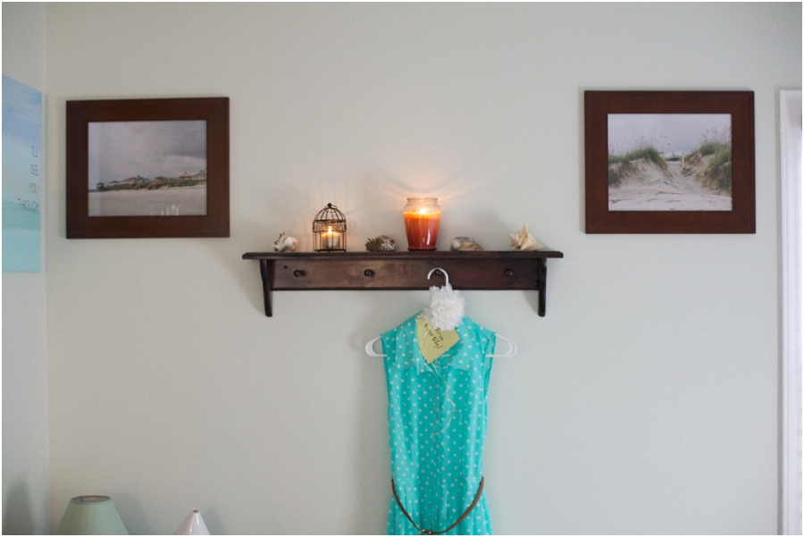 beautiful beach film photography hung on the wall of beach-cottage-themed bedroom makeover