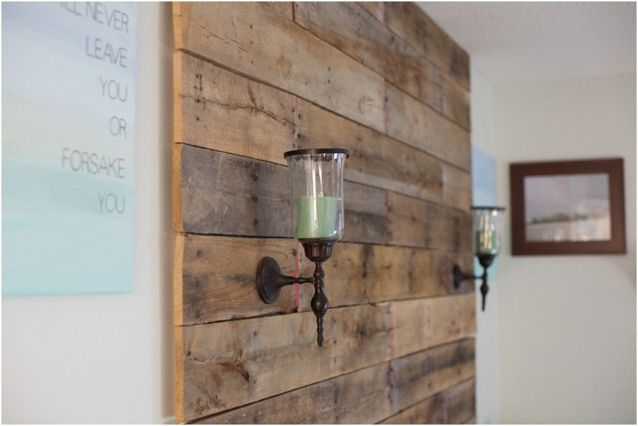inspiring quote on a beautiful canvas by rain drops on roses boutique, candle holders secured on diy pallet headboard, affordable interior decorating ideas 