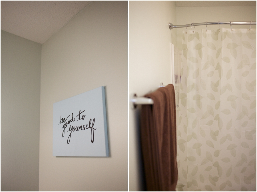 wall sign for home, brown terry towels hanging in remolded bathroom
