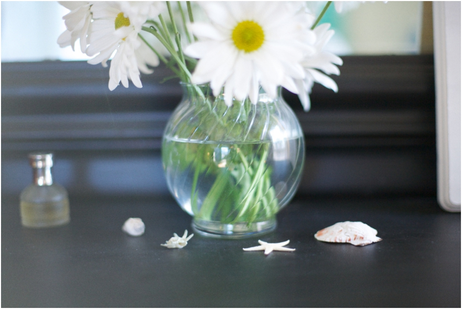 fresh flowers and little seashells make for simple and affordable decor on vintage dresser, simple interior decorating ideas