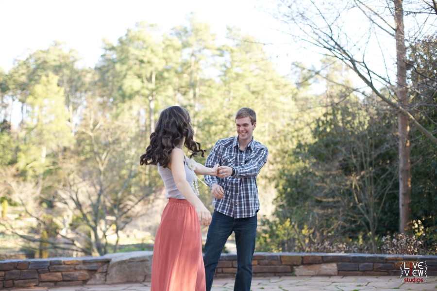 young couple dancing at duke gardens in nc, romantic couples portraits