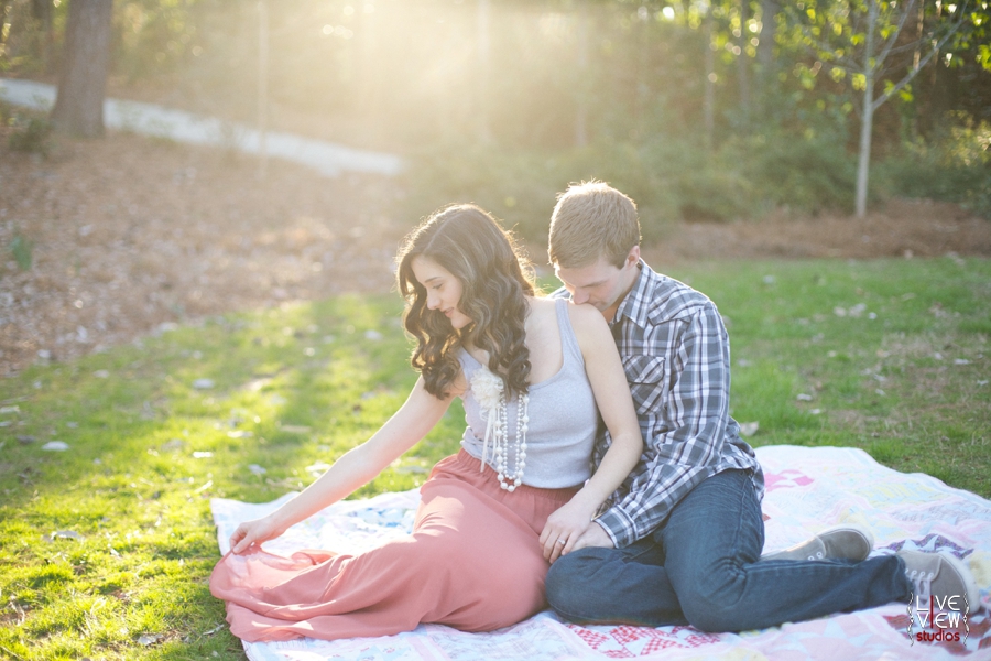 couple enjoying nature at duke gardens, romantic spring engagement photography 