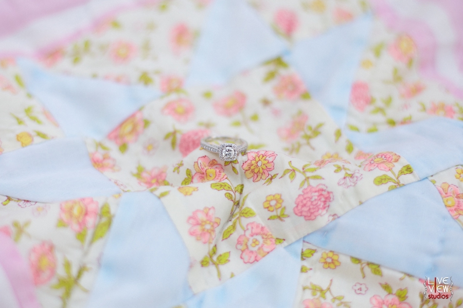 cute ring shots, engagement ring on heirloom quilt