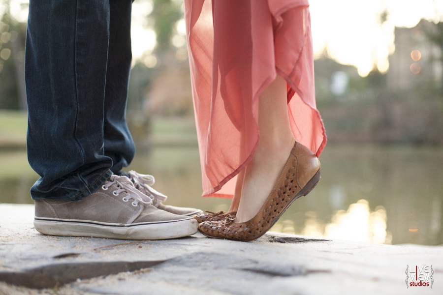 lakeside tip-toe kiss, romantic outdoor engagement photography