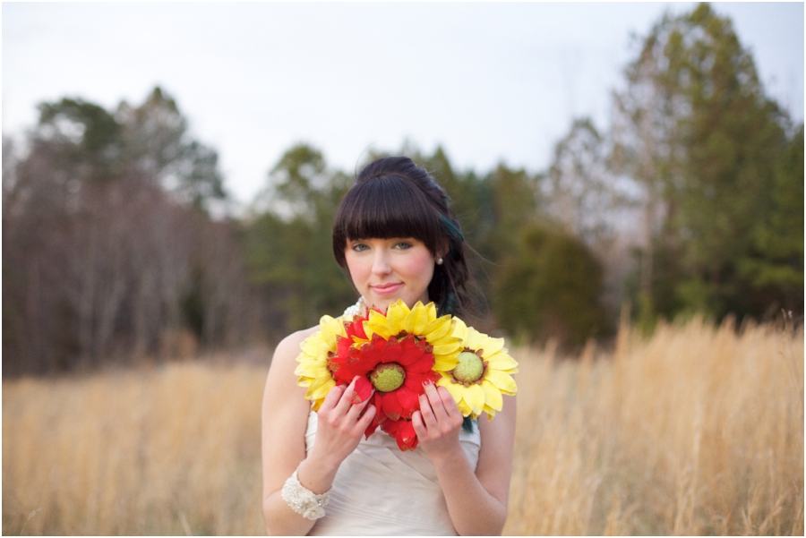 bright bridal bouquets, bride holding big bright red and yellow flowers
