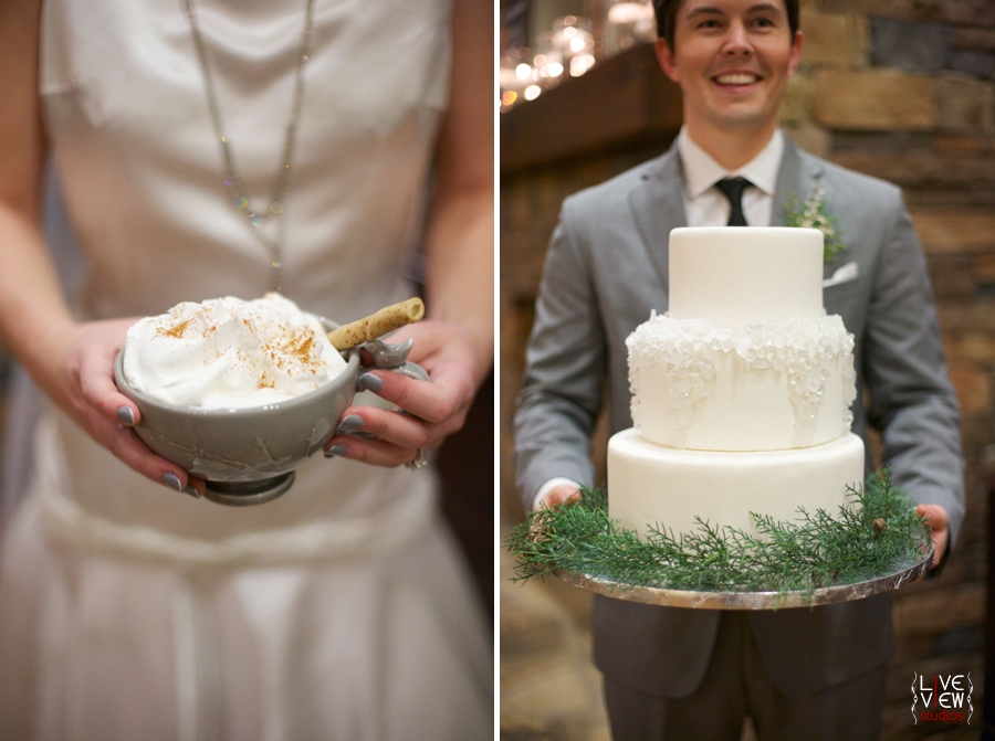 mug of hot chocolate with whipped cream and a pirouline wafer, groom carrying the wedding cake