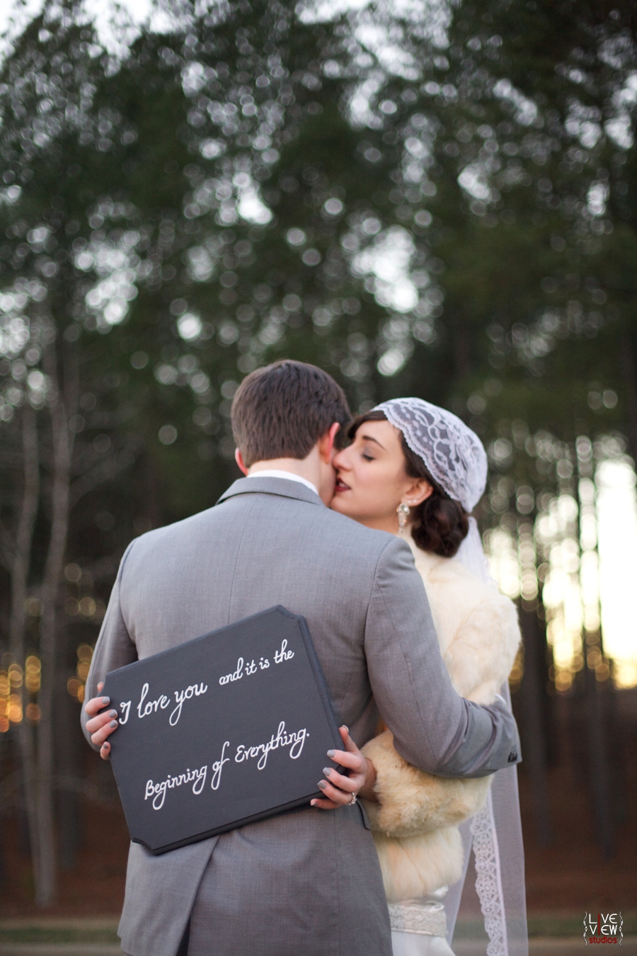 "I love you and it is the beginning of everything" sign from Raindrops on Roses Boutique, roaring twenties inspired wedding photography 