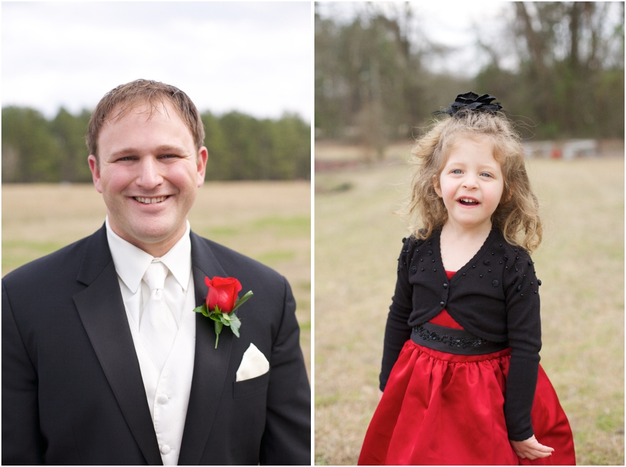 groom in black suit, white tie, and red rose boutonniere, elegant wedding photography