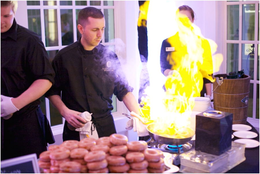 chefs making krispy kreme flambé at high grove wedding reception