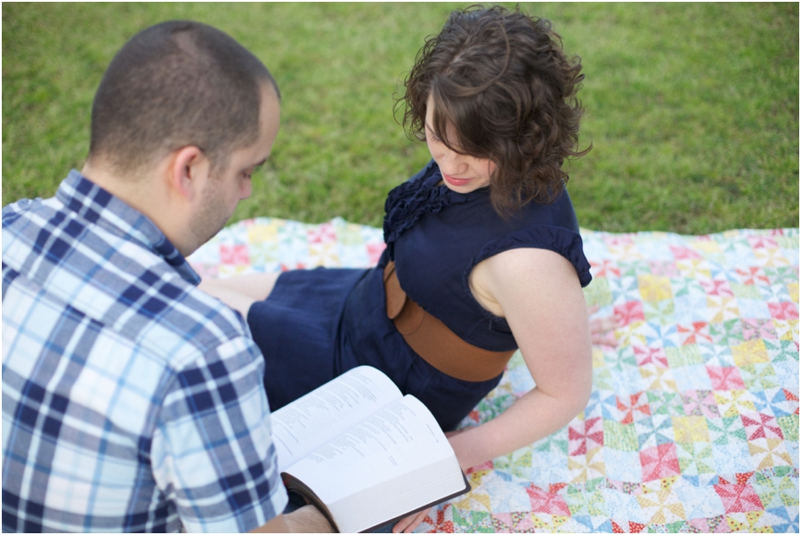 couple reading together, romantic engagement photo ideas