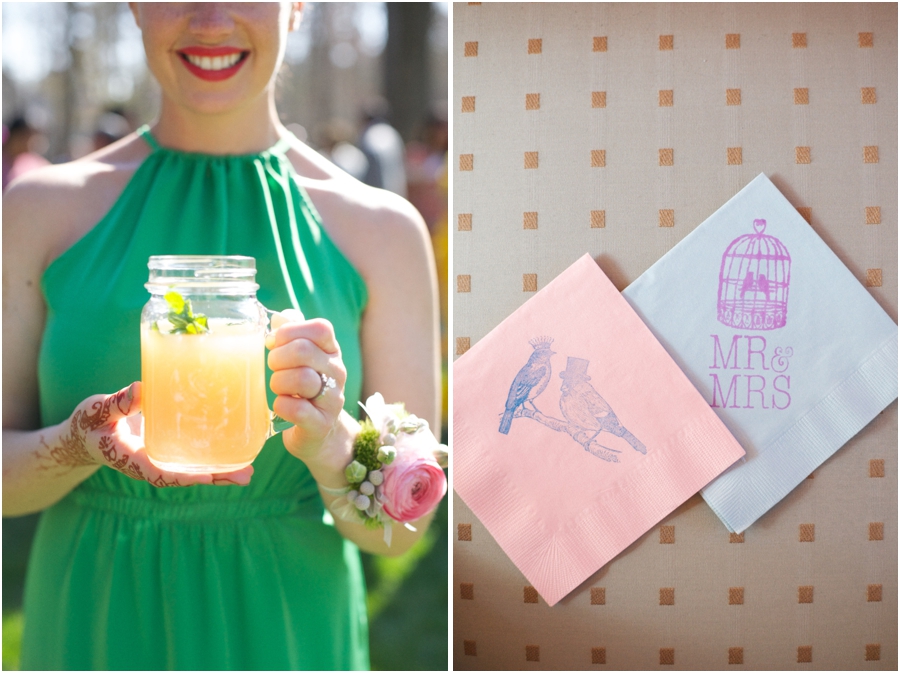 bridesmaid holding mint-topped grapefruit juice at wedding reception, stamped pink and blue napkins at reception