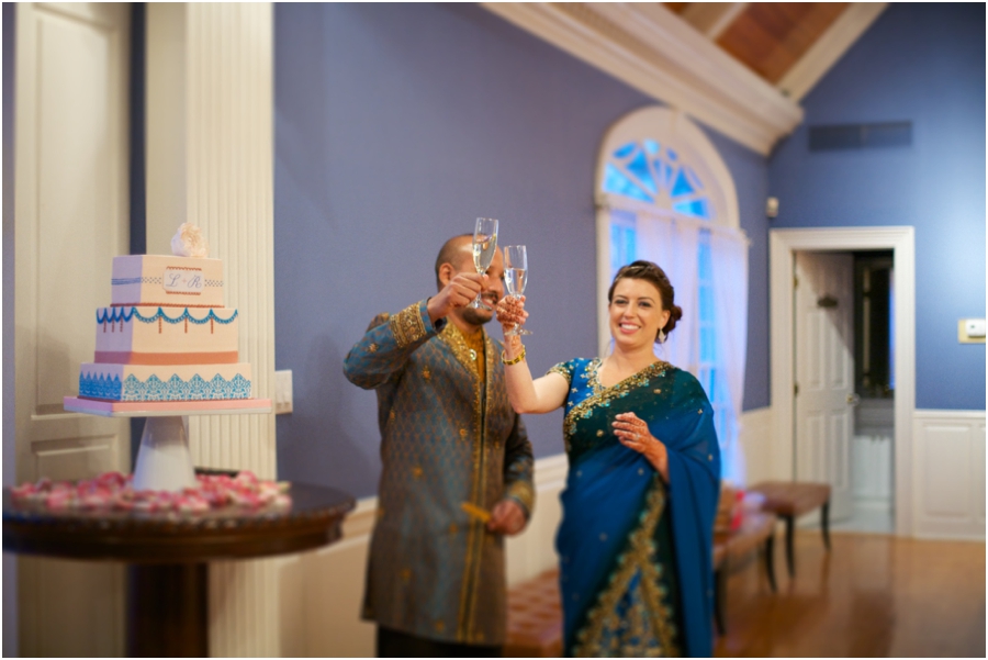 bride and groom toast at wedding reception