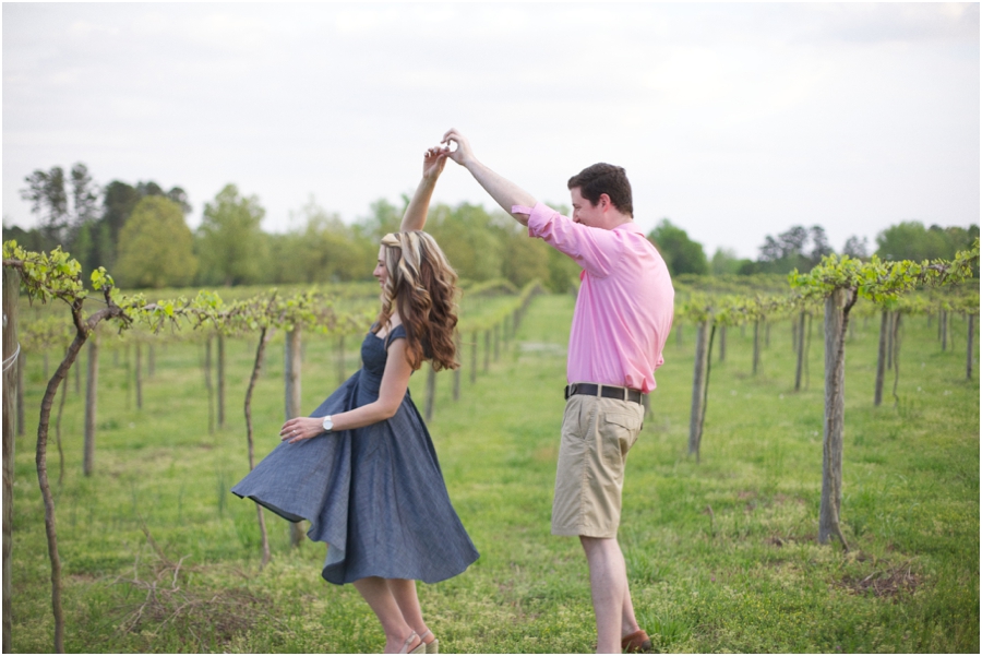 young couple dancing at a vineyard, romantic spring engagement photography