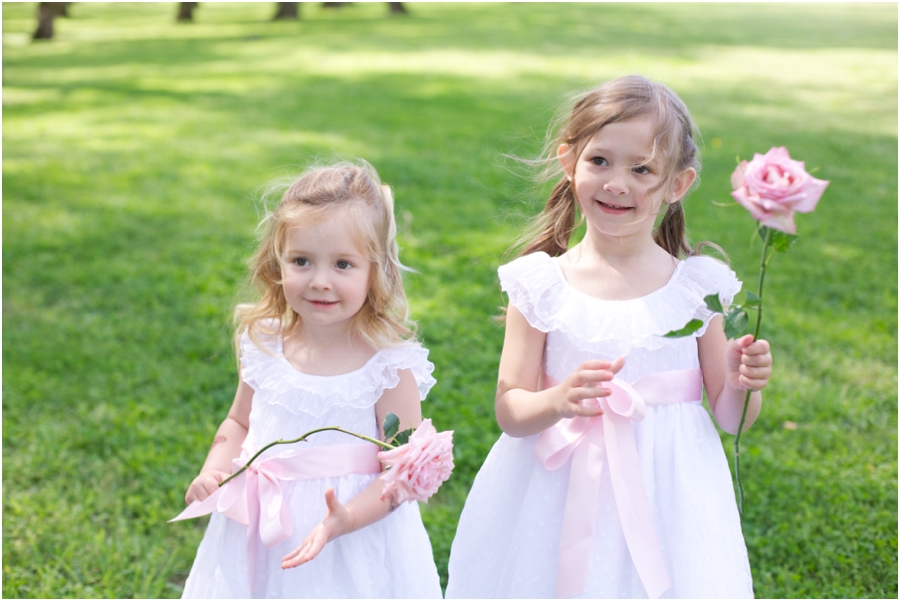 flower girls with long-stemmed light pink roses, southern wedding photography