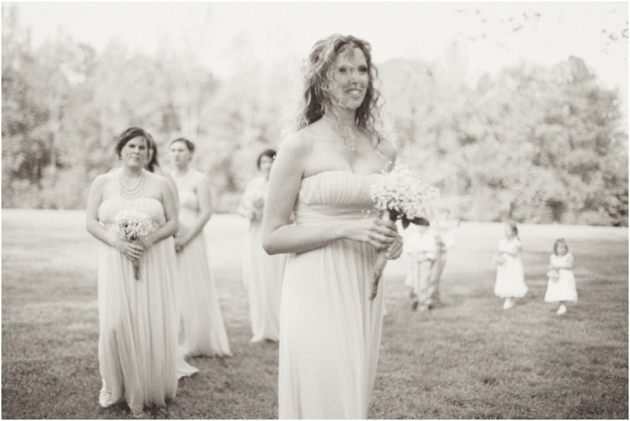 bridesmaids walking up at a beautiful outdoor wedding, vintage wedding photographers