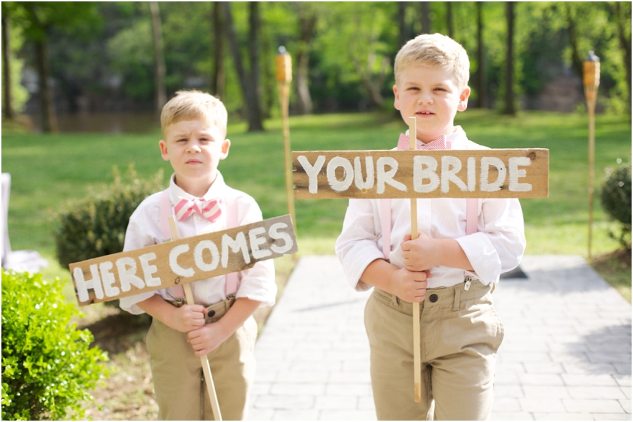 sign bearers in striped bow ties, vintage wedding photographers