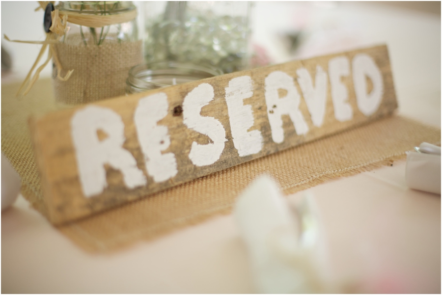 rustic reception inspiration, reserve seats with hand painted wood signs, southern wedding photography