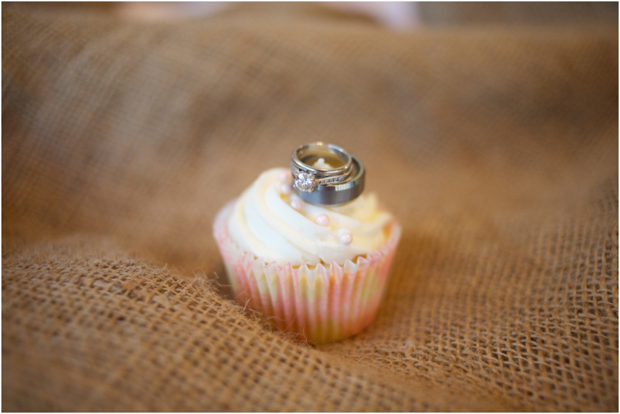 cute ring shots, wedding bands on creamy cupcake, rustic wedding photography