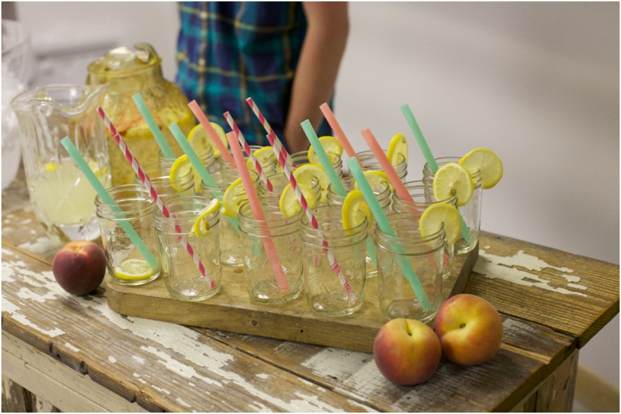 lemonade with paper straws and lemon slices in small mason jars, southern wedding photographers