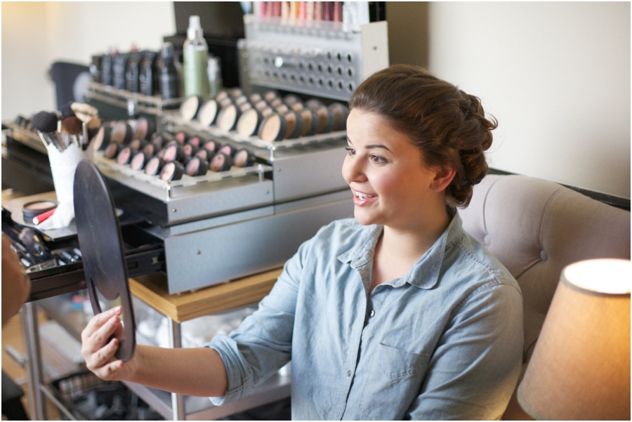 bride getting makeup done, raleigh nc wedding photographers