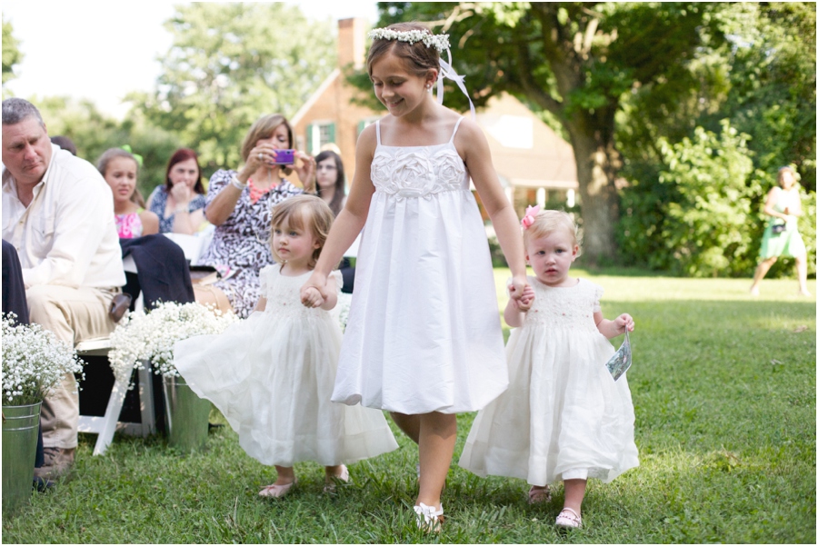 flower girls walking up the aisle at outdoor wedding, southern wedding photography