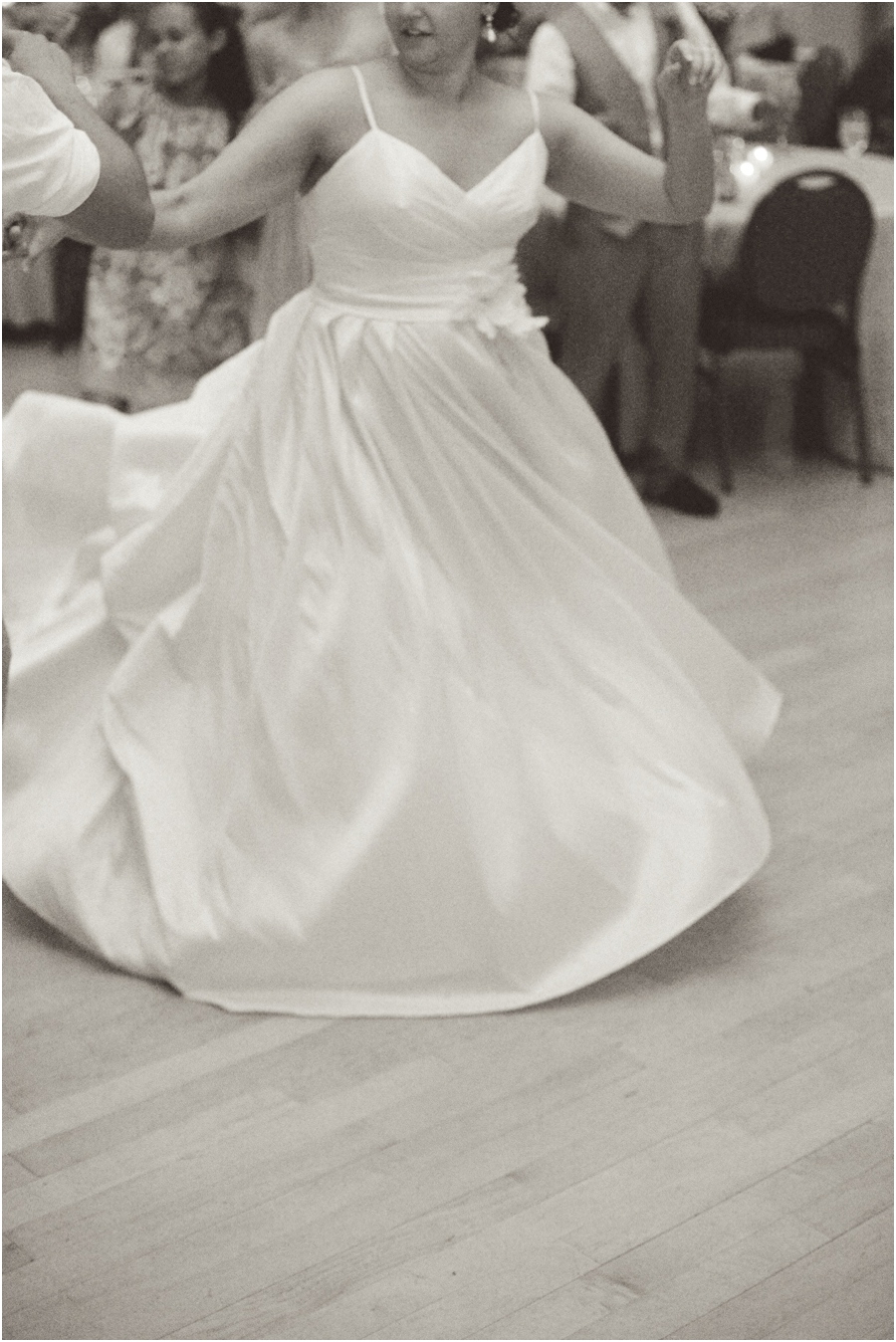 bride twirling on the dancing floor, vintage wedding photographers