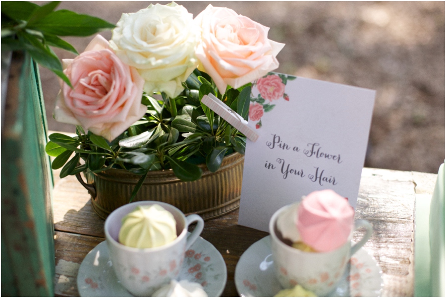 'pin a flower in your hair' bar at bridal luncheon with blush pink, cream, and peach roses 