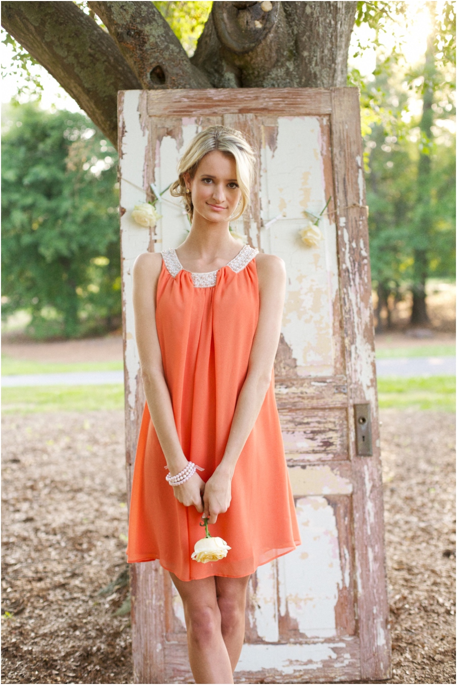 bridesmaid in cute coral dress, summer editorial photography