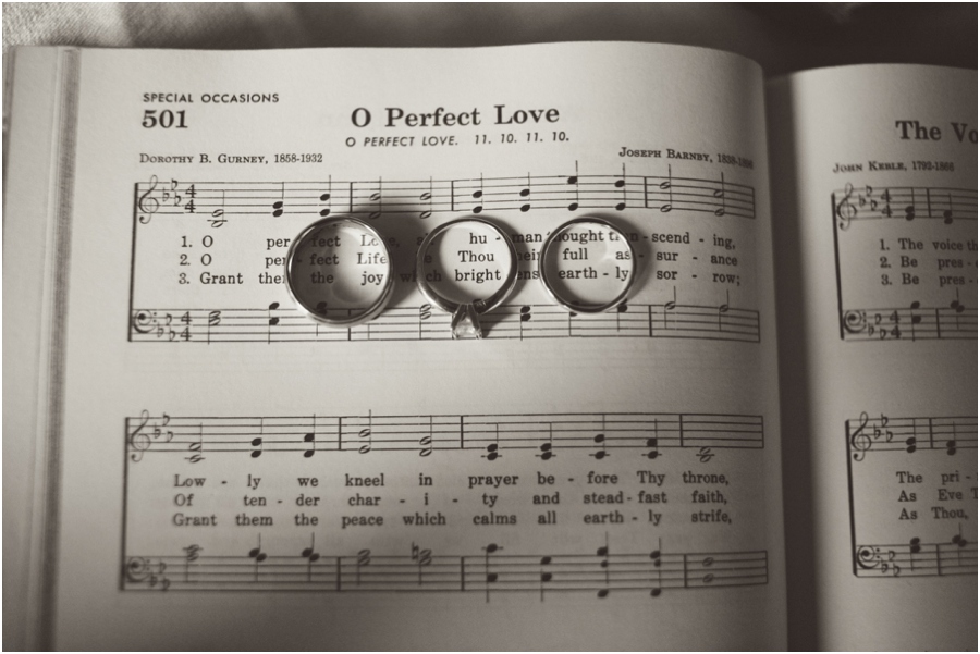 unique ring shots, wedding rings on couple's favorite hymn, southern wedding photography