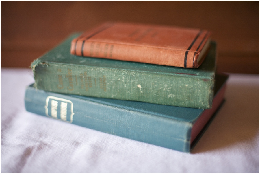couple's favorite books at wedding reception, rustic wedding photographer, raleigh nc