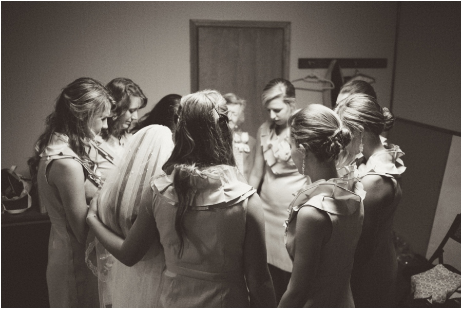 bridesmaids praying with bride before the ceremony, southern wedding photographers, raleigh nc