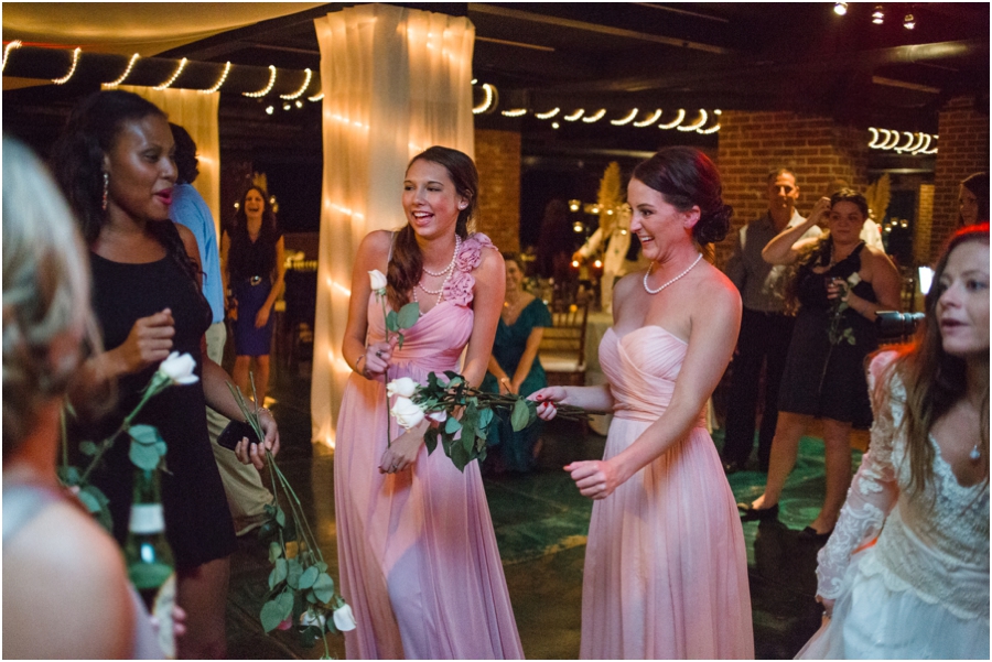 every girl got a flower when the bride threw a bunch of roses instead of her bouquet