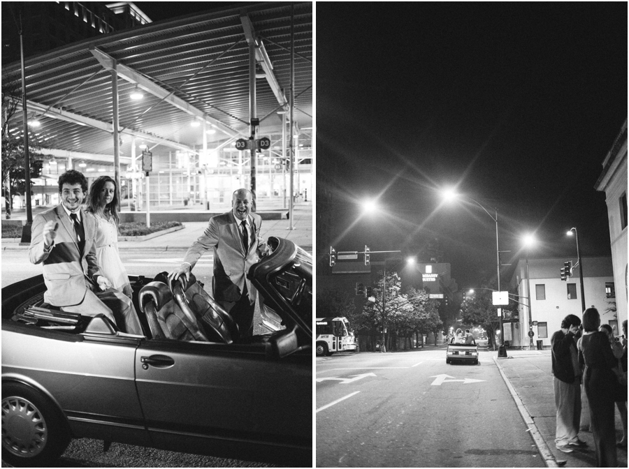 bride and groom in the back of a convertible, black and white wedding photography 